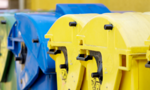 Yellow and blue waste containers.