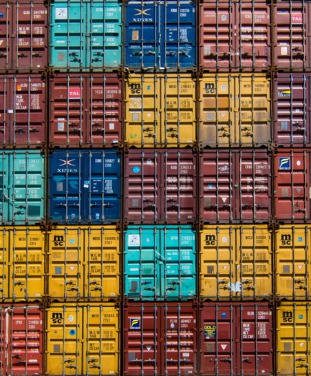 Colorful shipping containers stacked on each other. 