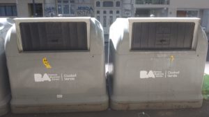 Two grey underground bins on the street in Buenos Aires