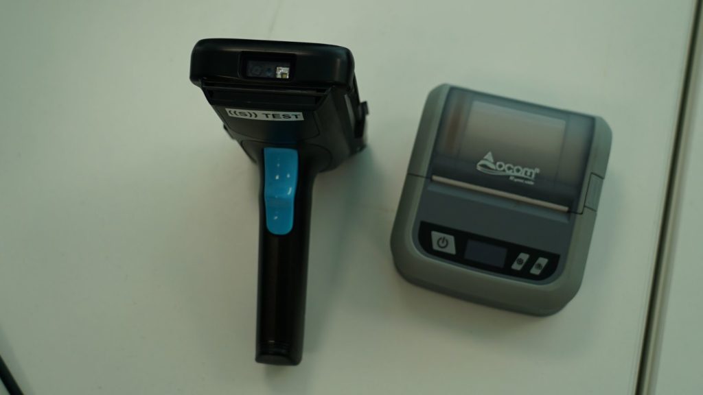 Hand scanner with small printer for returning the beverage containers in small collection points.