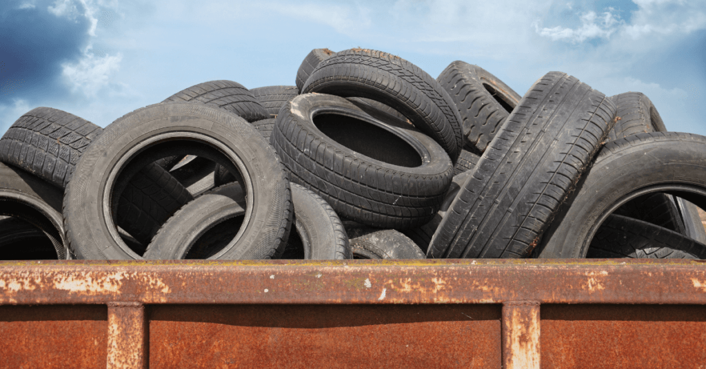 Old used tires in large capacity container.