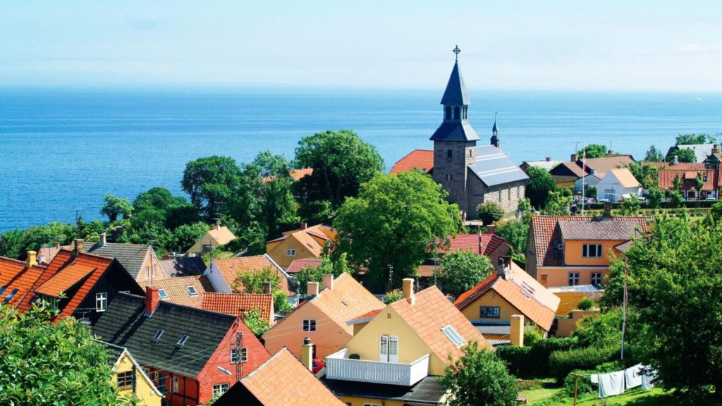 Zero waste island with colorful houses by sea which is located in Denmark.