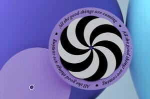 A pinwheel with a spiral design surrounded by soft-colored balloons.