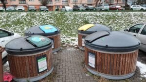 Modern underground recycling bins with categorized lids help keep public spaces clean and optimize waste collection.