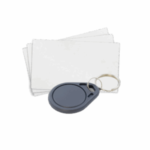 White cards and dark grey key fob used to acces waste storage.